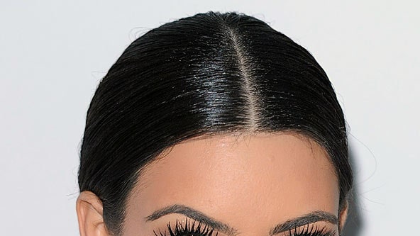 The Rise and Influence of Kim Kardashian’s Middle Parting Hairstyle 