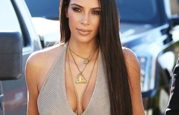 Kim Kardashian Gold Triangle Necklace: A Fashion Statement Worth Noticing